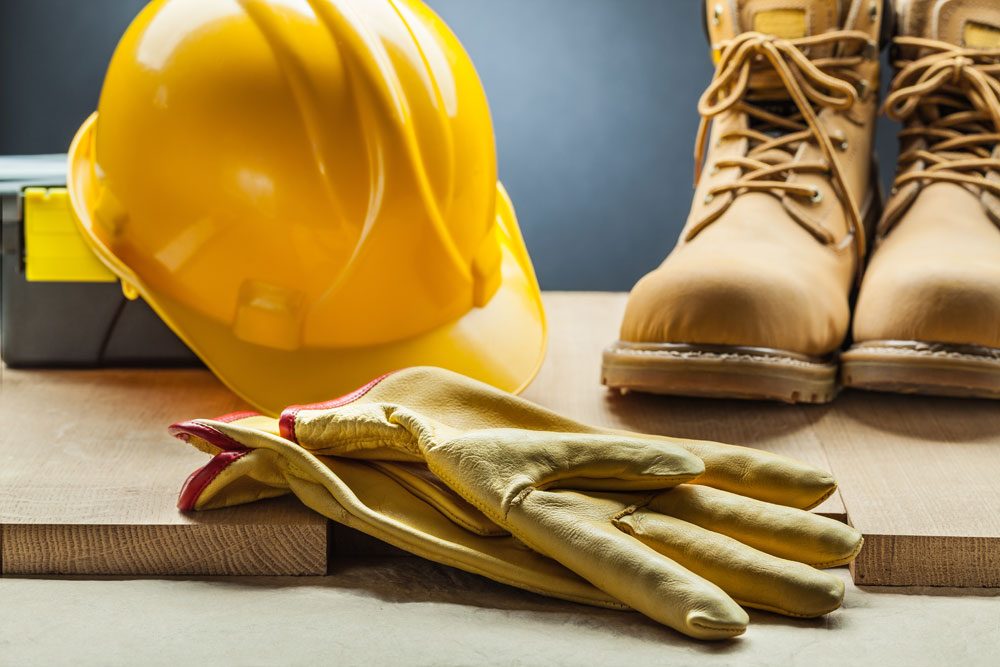 Handschuhe, Arbeitsschuhe und Helm Arbeitsschutz Ausrüstung